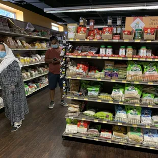 My wife Sabiha Sagri and son Tauqir Sagri are browsing the shelves.
