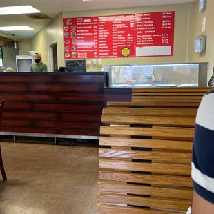 a man standing in front of a counter
