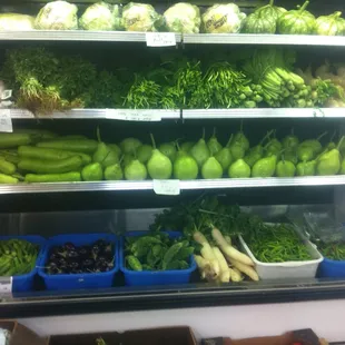 vegetables and fruits on shelves