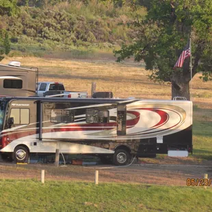 Spot 7 behind the gate.   Has water / electric with dump near by.  Also has a huge concrete pad and a half shelter