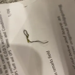 a pair of scissors on a piece of paper