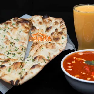 Makhni (Paneer, Chicken) with Garlic Naan and Mango Lassi