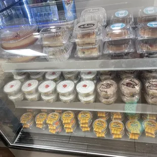 a display case of cupcakes