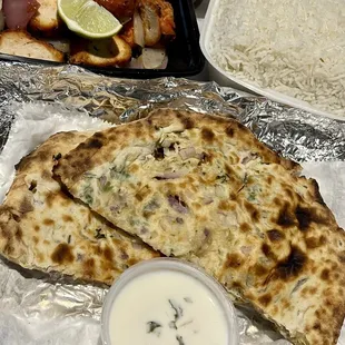 Tandoori Chicken Tikka with Tamarind Chutney (Brown) and Onion Kulcha with Raita