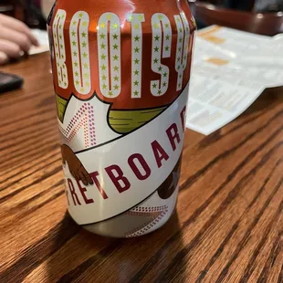 a can of soda on a table