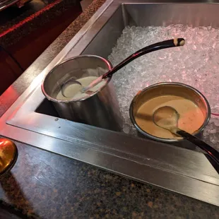 three bowls of soup in ice