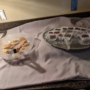 a tray of cookies and a bowl of cookies