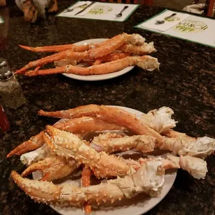 Crabs and dinosaurs in fur coats.