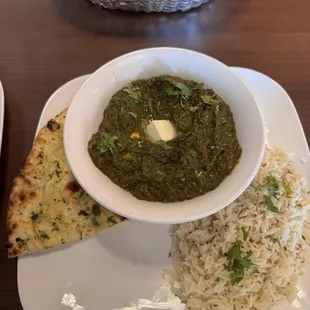 Saag Paneer with rice and garlic naan; there was more garlic naan that was not in this photo.
