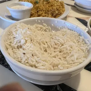 Chicken curry and butter chicken come with plain rice