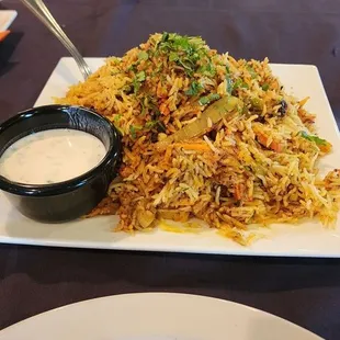 Chicken biriani...  Wow. Awesome. Couldn't stop eating it.. Wish it had a bit less rice and more chicken. And a lot less oil