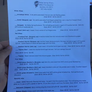 a hand holding a letter from a customer