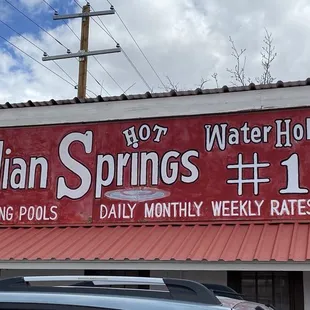 Sign advertising the hot springs