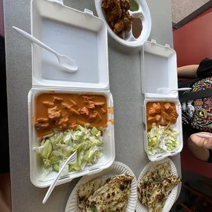 Chicken Tikka Masala with a side of salad and garlic naan, next to vegetable Paneer Pokora. Very flavorful.