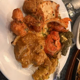 My delicious plates, with a generous serving of each of our main entrées! Highly recommend the tandoori chicken
