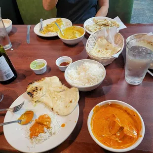 Butter chicken masala and  Mughalai chicken curry Garlic naan and Butter naan