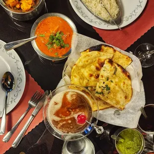 Garlic naan, manhattan, chicken tikka Masala, aloo Gobi