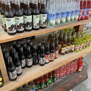 a shelf full of bottles