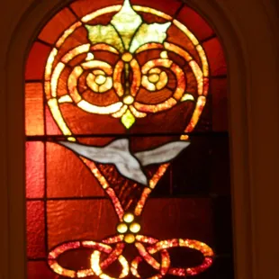 Stained glass just right of the stage