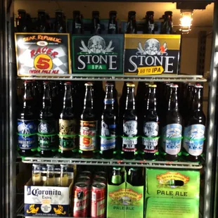 a refrigerator full of beer bottles