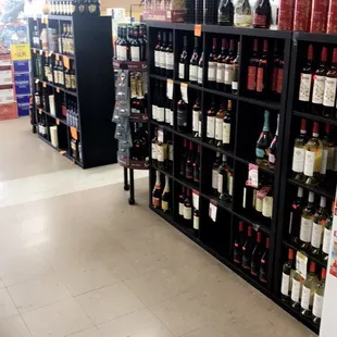 shelves of wine in a store
