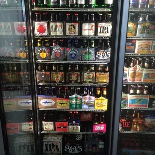 a refrigerator full of beer bottles