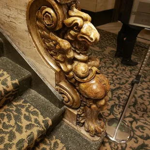 a close up of a carved stair