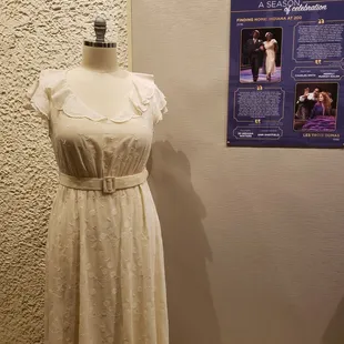 a white dress on display