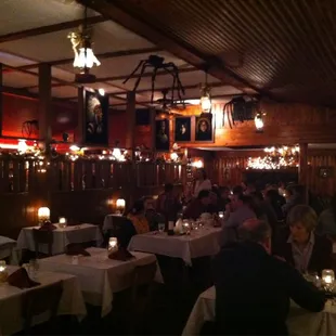 a large group of people sitting at tables