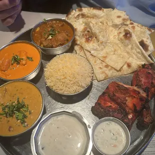 Combo meal (butter chicken, black lentil curry, tandoori chicken)