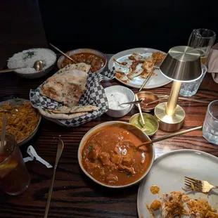 Chicken Vindalu, chicken biryani, and garlic naan.