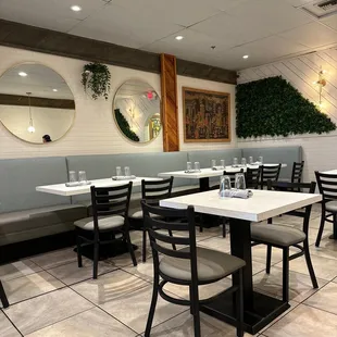 Dining room, clean neat, bright with new tables and chairs.