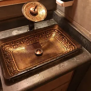 a bathroom sink and mirror