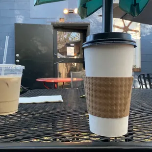 two cups of coffee on a table