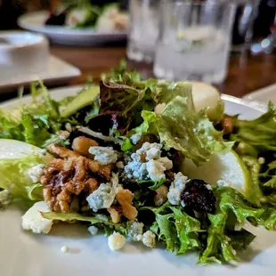 a plate of salad on a table