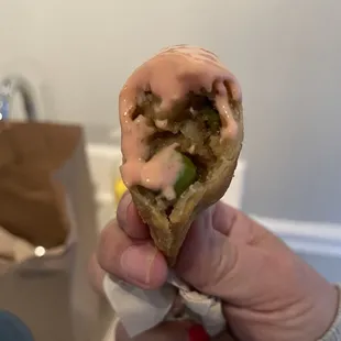 Samosas with pink sauce