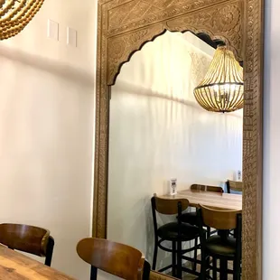 a dining room with a table and chairs