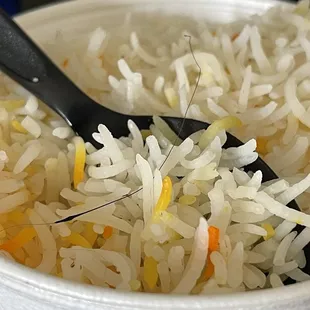 Black hair in my rice