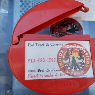 a close up of a sign on a food truck