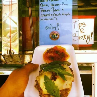 a person holding a plate of food