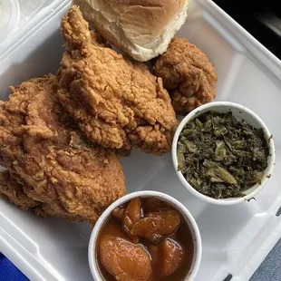 Leg, thigh, breast with a side of greens and sweet potatoes with a roll