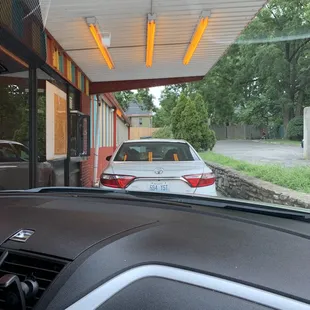 a car parked in front of the restaurant