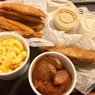 Chicken tenders, Mac and cheese, yams and a wedge.