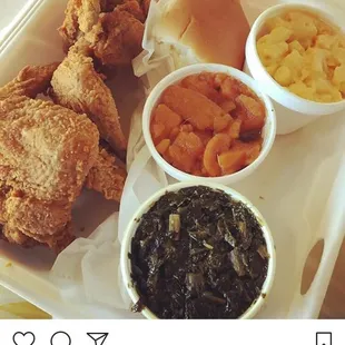 Spicy wing meal with greens, yams and main cheese.