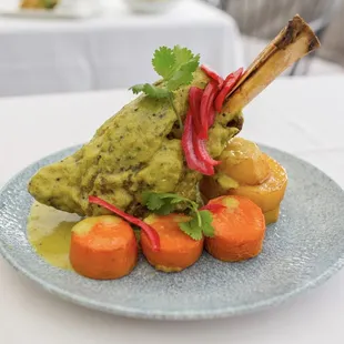 Lamb Korma  braised australian lamb shank, carrots, potatoes, coriander cumin curry