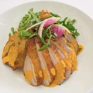 Duck Kapitan  maple leaf duck confit, seared breast, arugula salad,  mild kaffir lime curry