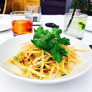Green papaya mango salad w peanuts, chili, lemongrass lime vinaigrette