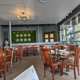 a restaurant with tables and chairs