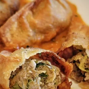 Lamb Dumpling - spiced ground meat ,onion tomato chutney