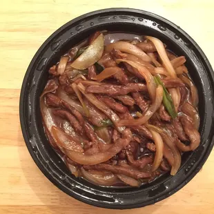 Mongolian beef. It's pretty good. It's savory and the beef is sliced thinly along with onions. The beef is tender.